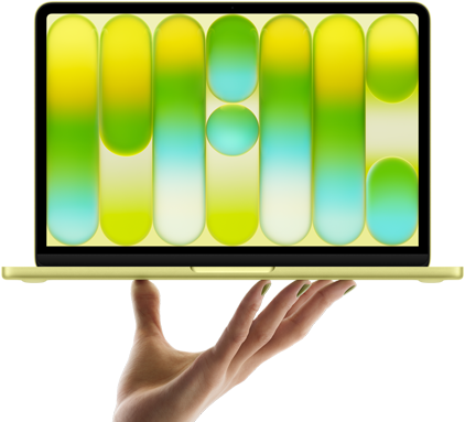 MacBook Neo en color amarillo cítrico, sostenida en equilibrio en la punta de los dedos de una mano abierta, la pantalla muestra un patrón abstracto y colorido