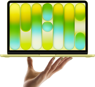 MacBook Neo en color amarillo cítrico, sostenida en equilibrio en la punta de los dedos de una mano abierta, la pantalla muestra un patrón abstracto y colorido